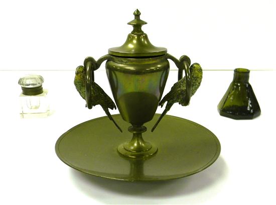 Three inkwells: urn-shaped brass inkwell