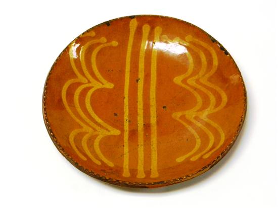 Redware dish with raised sides  yellow