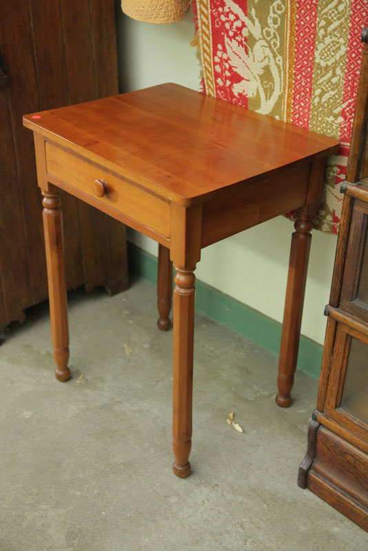 ONE DRAWER STAND. Cherry having a wooden