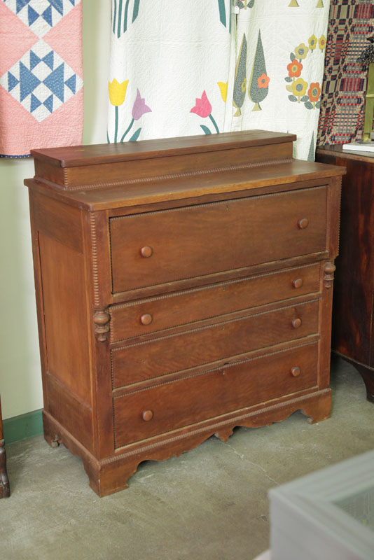 CHEST OF DRAWERS. Cherry having a lift