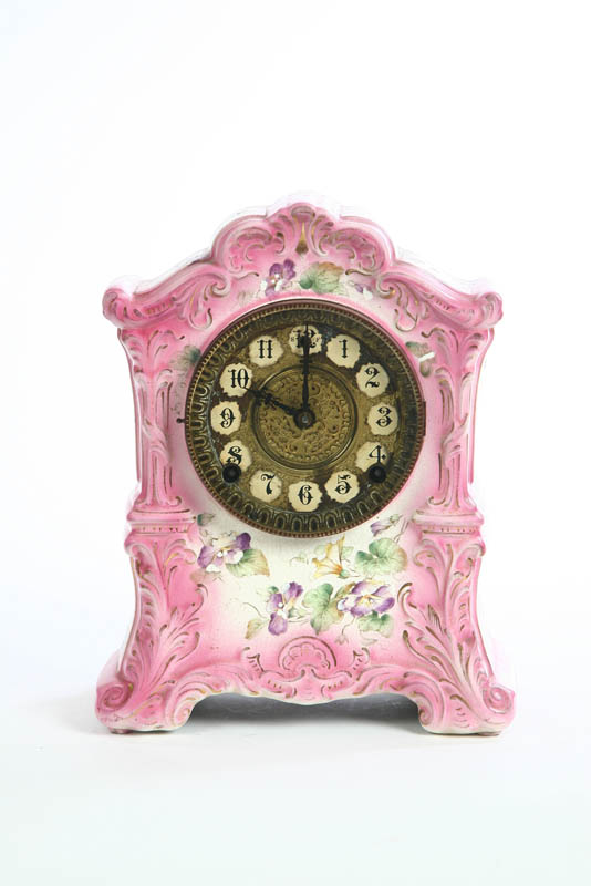 CHINA MANTLE CLOCK. Eight day time and