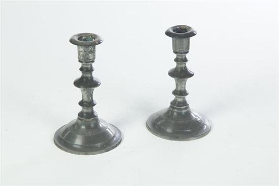 TWO PEWTER CANDLESTICKS.  Touch