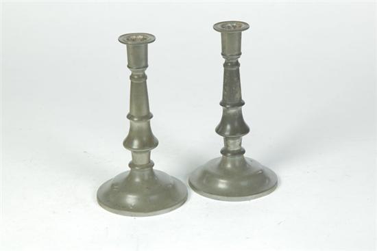 PAIR OF PEWTER CANDLESTICKS.  Touchmark