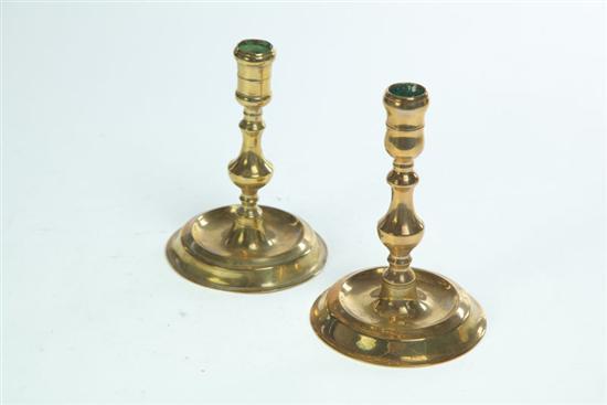 TWO BRASS CANDLESTICKS Probably 12153b