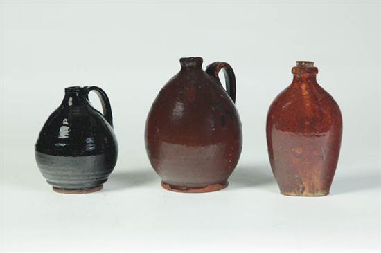 THREE REDWARE BOTTLES AND FLASKS.  American