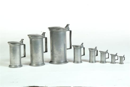 SET OF EIGHT PEWTER MEASURES. 
