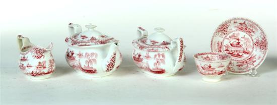 CHILD'S RED STAFFORDSHIRE TEA SET.