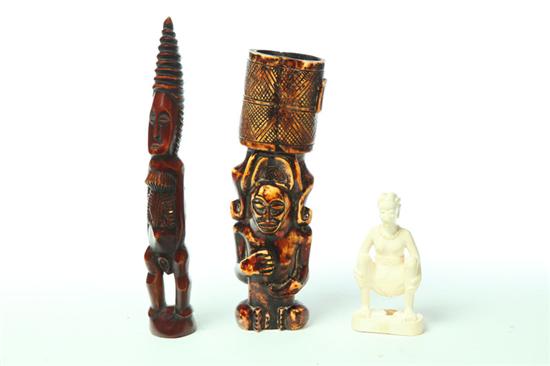 THREE CARVED IVORY FIGURES.  Africa