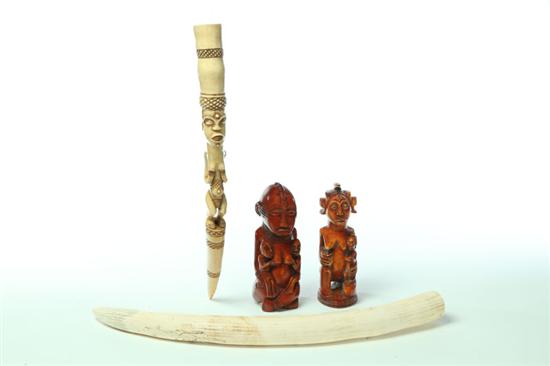 THREE IVORY CARVINGS AND TUSK.