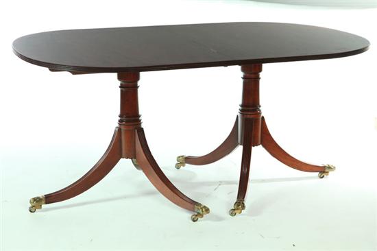 NEOCLASSICAL-STYLE DINING TABLE.