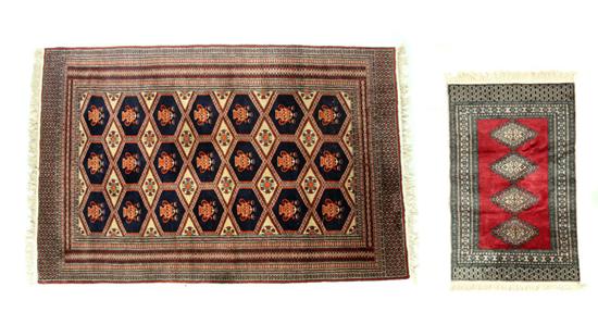 TWO ORIENTAL RUGS Late 20th century  121bf8