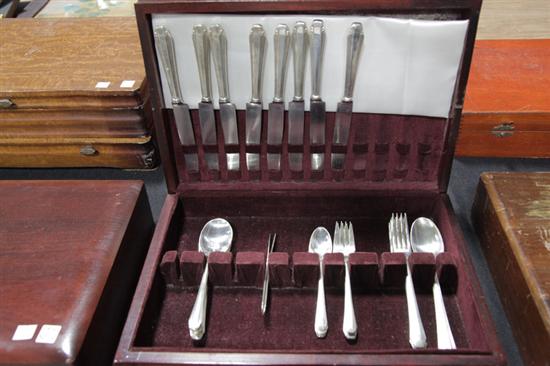 SET OF STERLING SILVER FLATWARE. By