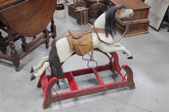 CHILDS ROCKING HORSE. Carved and and