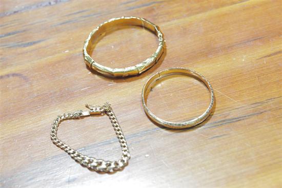 THREE GOLD BRACELETS Two bangles 121ec8