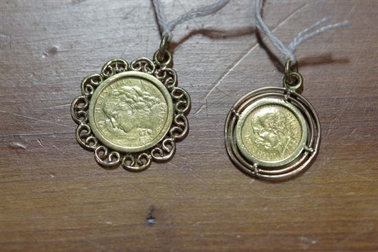 TWO GOLD COINS Both set in bezels  121ee9
