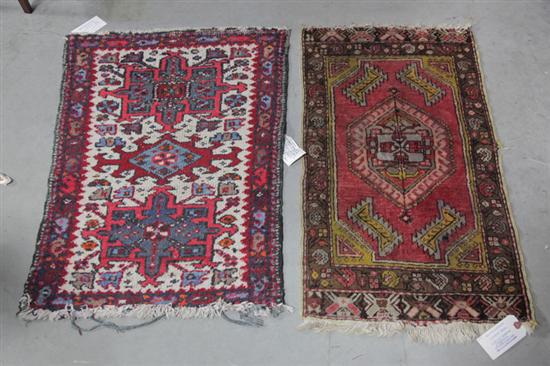 TWO ORIENTAL STYLE MATS Red ground 121f24