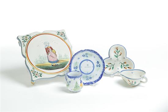 TWO QUIMPER CUPS AND SAUCERS AND A FOOTED