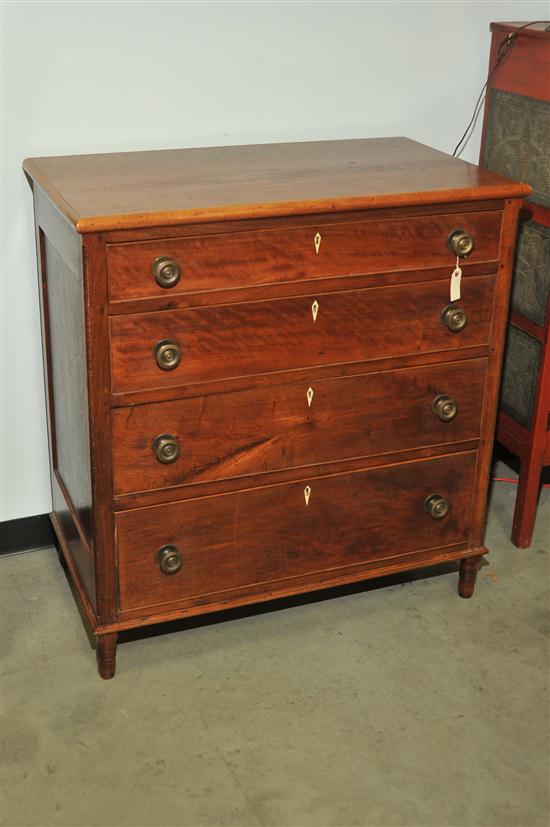 CHEST OF DRAWERS. Walnut with curly