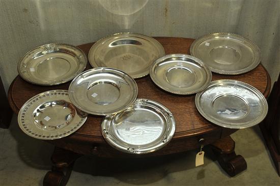 EIGHT ROUND STERLING SILVER TRAYS.