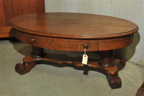 SIDE TABLE. Oval  oak table with single
