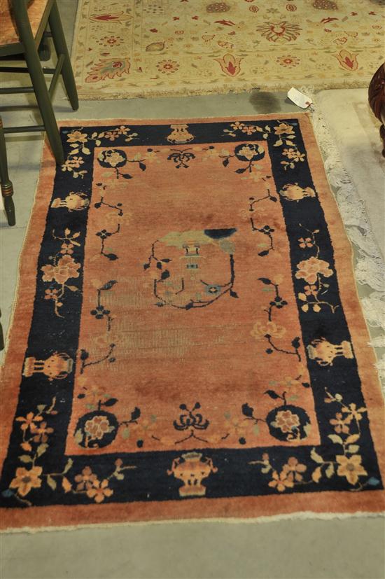 TWO ORIENTAL STYLE RUGS. An area