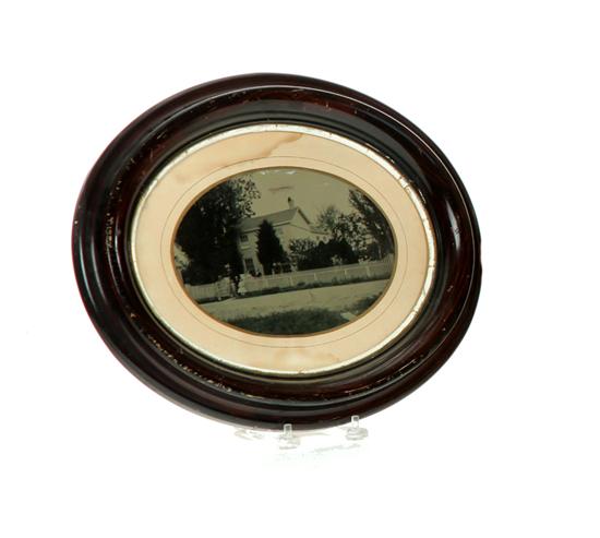 TINTYPE OF FAMILY STANDING IN FRONT