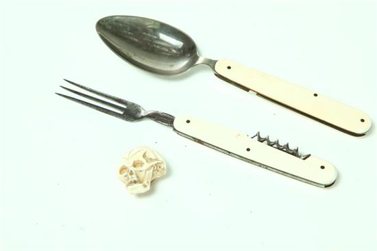 TWO FOLDING UTENSILS AND A BUTTON.