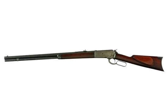 WINCHESTER MODEL 1886 LEVER ACTION RIFLE.