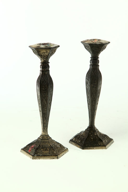 PAIR OF SILVER PLATE CANDLESTICKS.