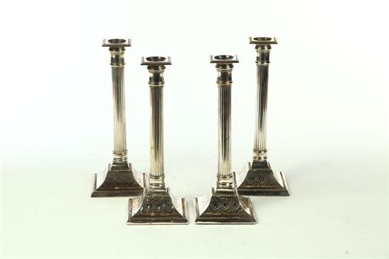 FOUR NEOCLASSICAL CANDLESTICKS.  American