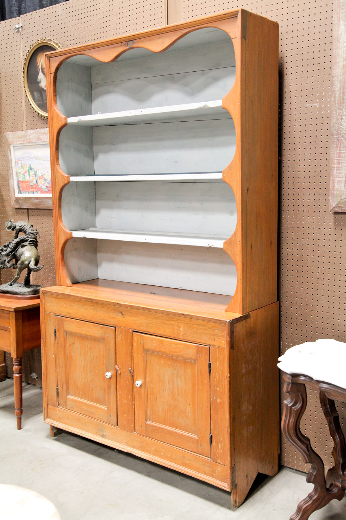 TWO PIECE OPEN PEWTER CUPBOARD.