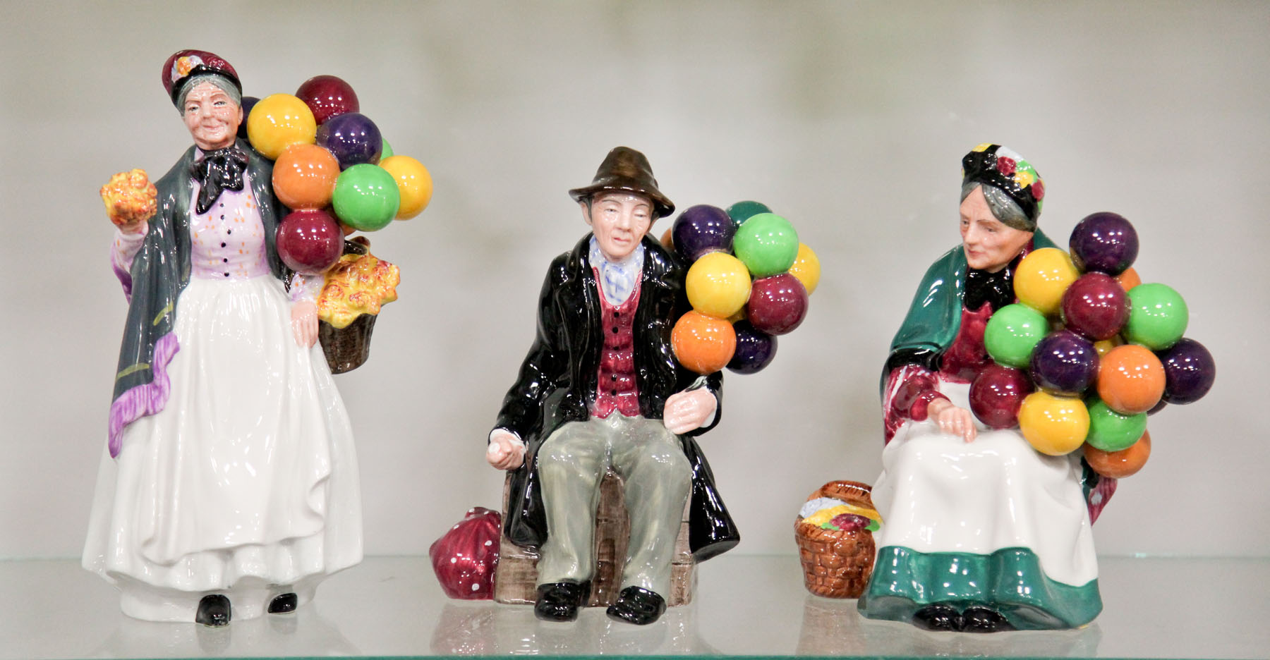 THREE ROYAL DOULTON FIGURINES.