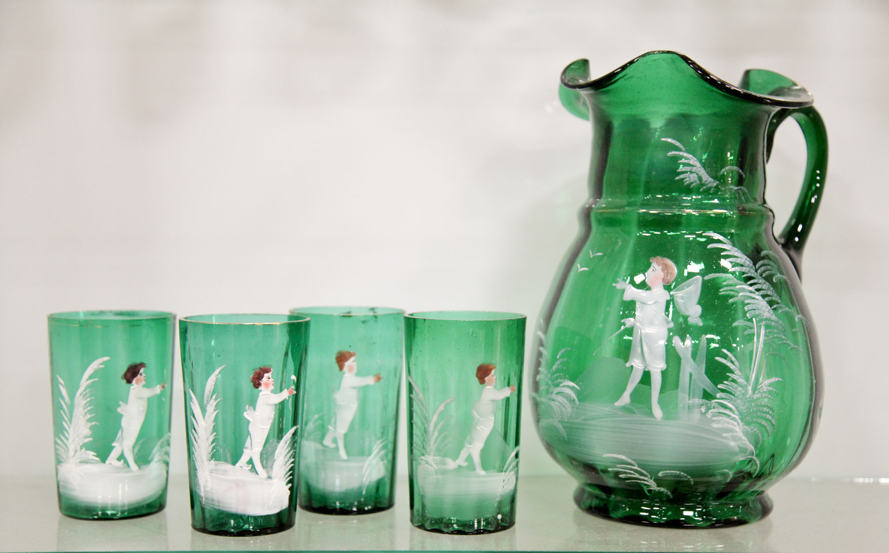 FIVE PIECE MARY GREGORY BEVERAGE SET.