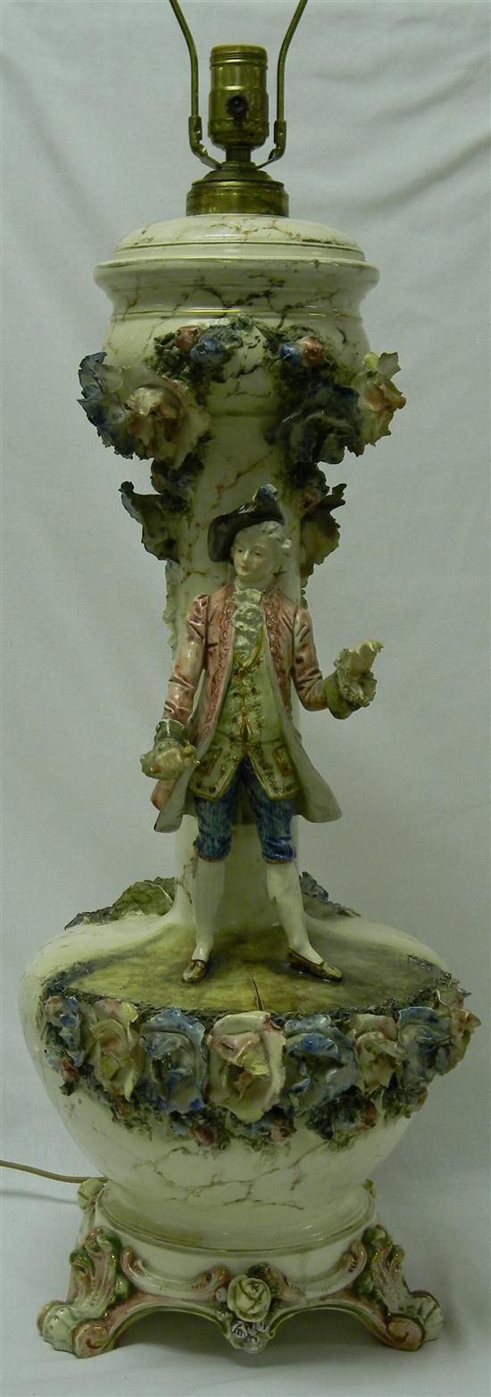 Majolica lamp with a man holding 1206ef