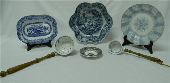 Two strainers with blue and white porcelain