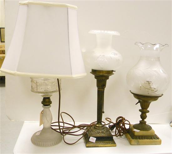 Three lamps: two with metal or stone