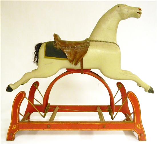 Early rocking horse on platform base