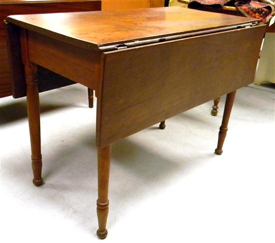 19th C. pine drop leaf table  round