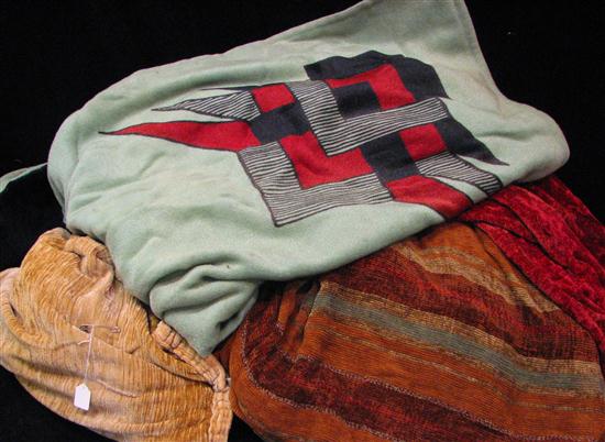 Two deco blankets  one green  red