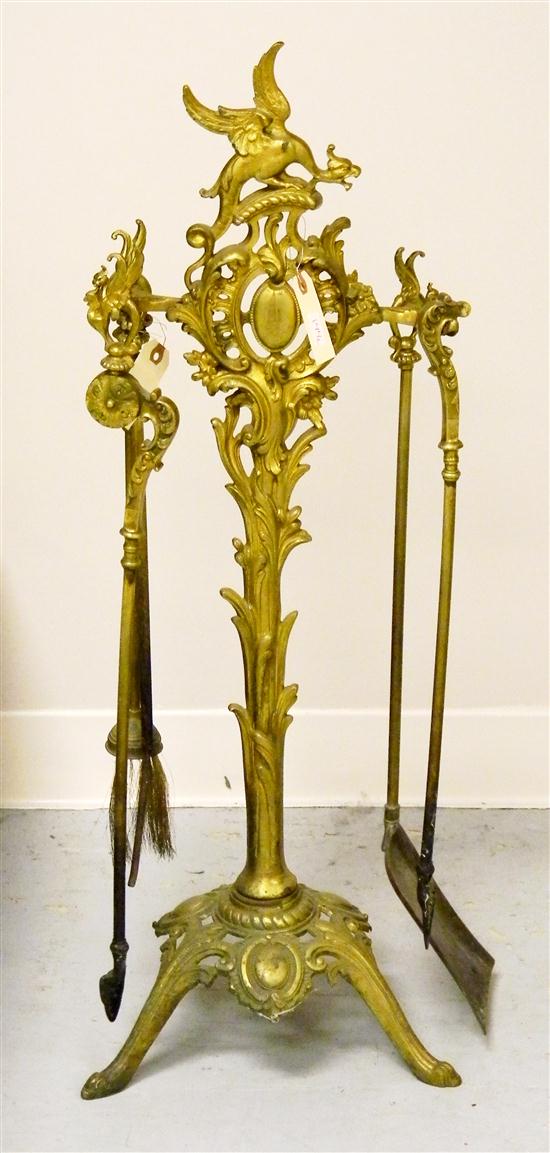 Fireplace accoutrements on rack  brass
