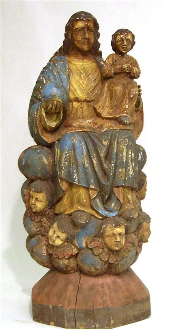 Carved wood Madonna holding Christ 120b02