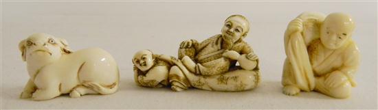 Ivory netsuke: boy pulling man