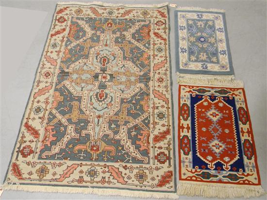Rug with red field  ivory and blue