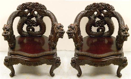 Pair of Chinese carved dragon armchairs