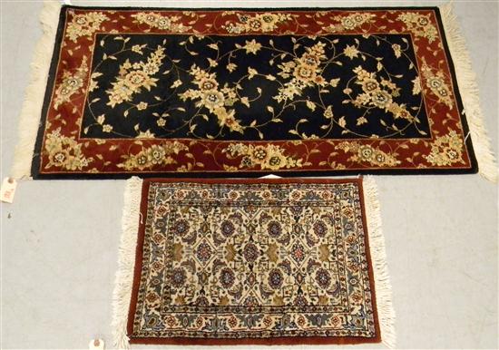 Rug  black field  red border  handknotted