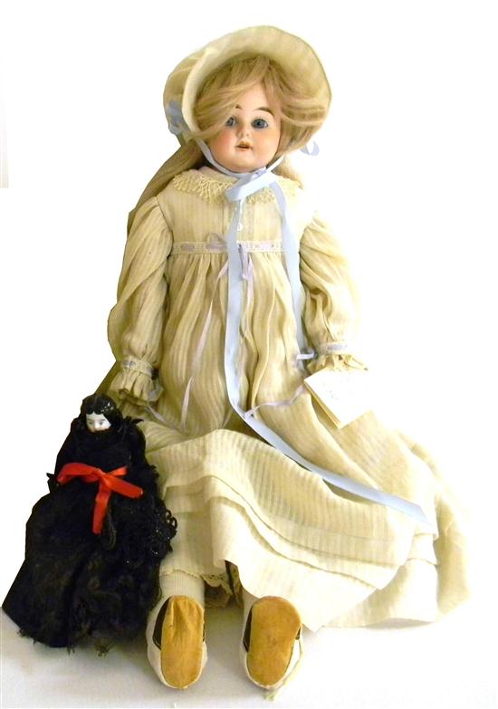 German bisque head doll blonde
