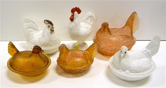 Four glass hens on nests and one rooster