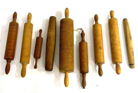 Nine rolling pins  various shapes  one