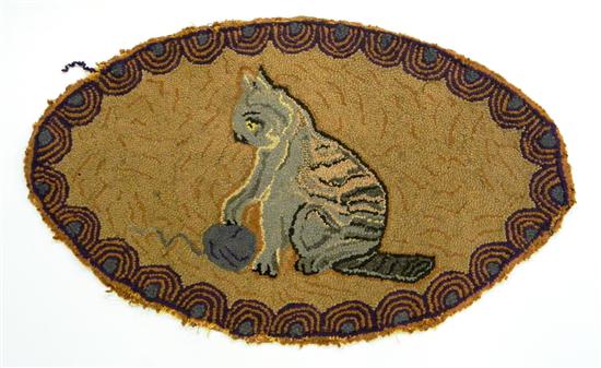 Oval hooked rug  cat with ball