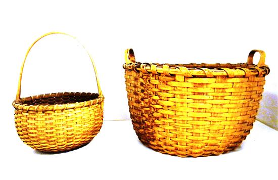 Two woven baskets  one double carrying